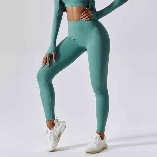 Femme en legging taille haute, tissu gainant et élastique